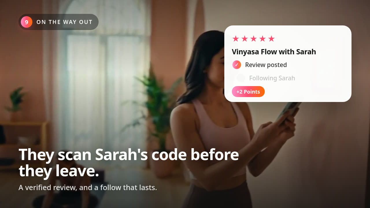 A student leaving a verified review after class in LedBy